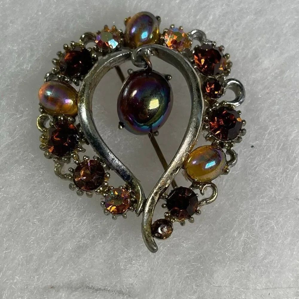 VTG Lisner faux Amber colored dangle cabochon brooch.